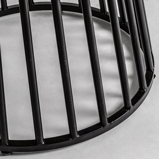 Close-up of the Vicalhome industrial style dining table featuring a sleek black metal frame